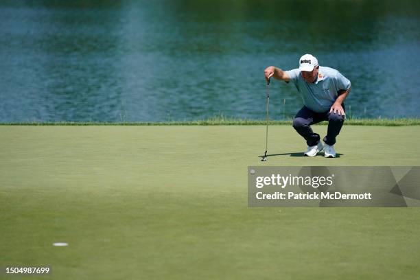 Mark O'Meara of the United States putts on the 13th hole during the first round of the U.S. Senior Open Championship at SentryWorld on June 29, 2023...