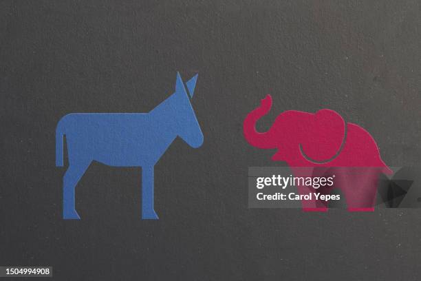 democratic blue donkey and republican red elephant - democratic party united states stock pictures, royalty-free photos & images