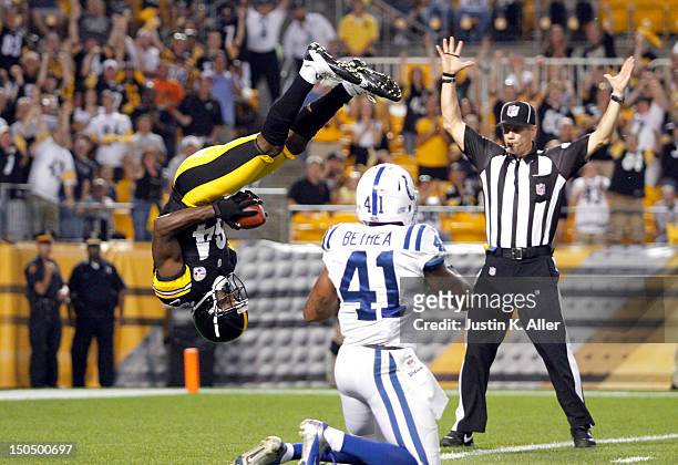 Antonio Brown of the Pittsburgh Steelers scores a touchdown on Antoine Bethea of the Indianapolis Colts in the first quarter during the game on...