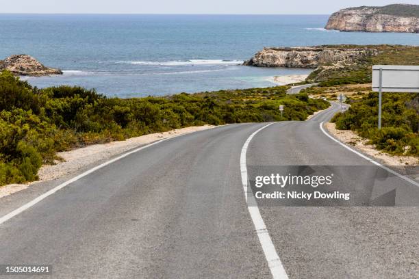 winding coastal road - coastal road stock pictures, royalty-free photos & images