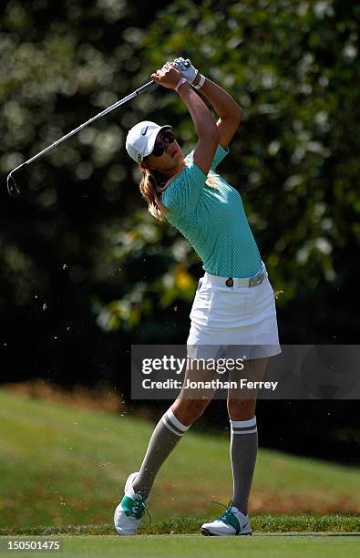 Michelle Wie hits her second shot on the 2nd hole during the final round of the Safeway Classic at Pumpkin Ridge Golf Club on August 19, 2012 in...