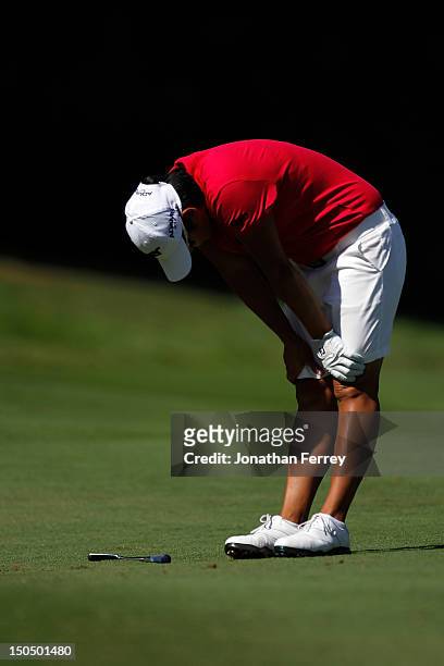 Yani Tseng of Tawain reacts to her second shot on the 7th hole during the final round of the Safeway Classic at Pumpkin Ridge Golf Club on August 19,...