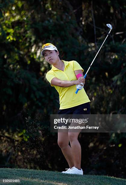 Haeji Kang of South Korea chips on the 17th hole during the final round of the Safeway Classic at Pumpkin Ridge Golf Club on August 19, 2012 in North...