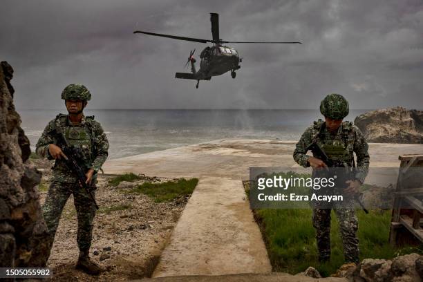 Philippine Air Force Black Hawk helicopter lands on June 29, 2023 in Mavulis Island, Batanes, Philippines. Amid increasing geopolitical tension...