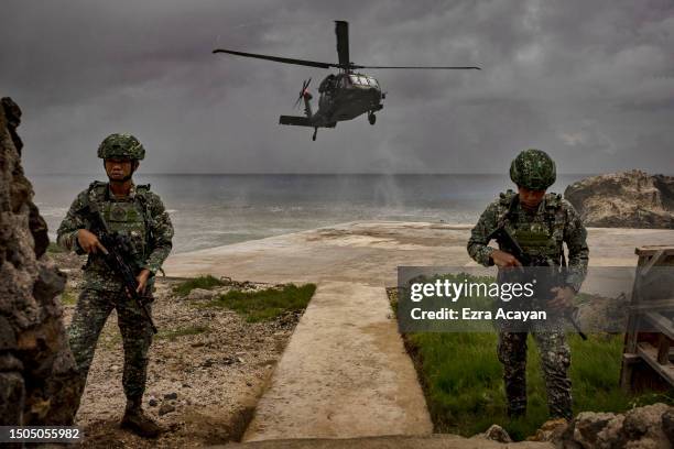 Philippine Air Force Black Hawk helicopter lands on June 29, 2023 in Mavulis Island, Batanes, Philippines. Amid increasing geopolitical tension...