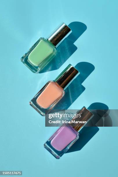 make-up nail polish bottles - purple nail polish stock pictures, royalty-free photos & images