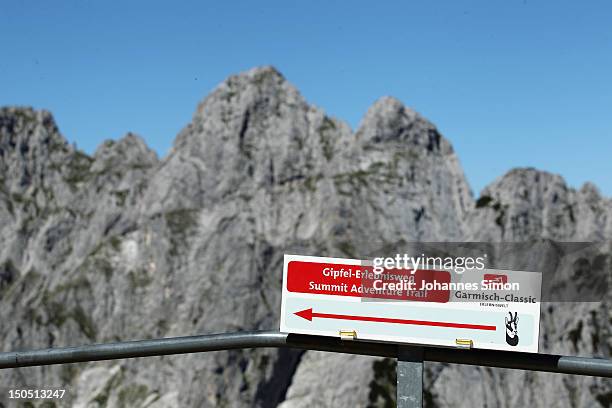 Sign reads 'Summit Adventure Trail' at the base of Alpspitz peak on August 19, 2012 near Garmisch-Partenkirchen, Germany. The German Alps especially...