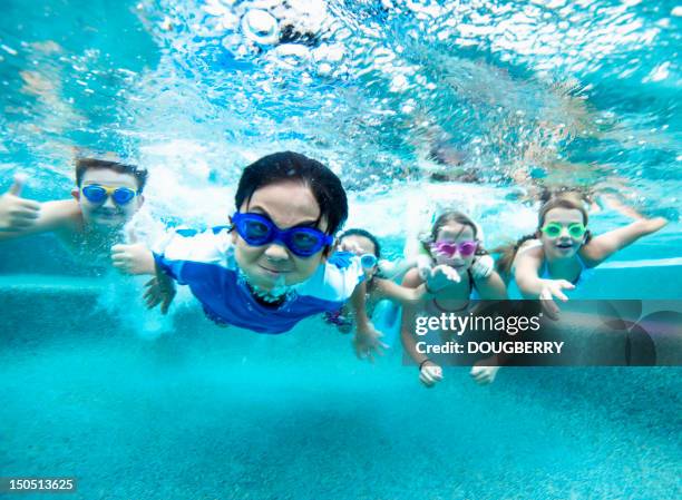 underwater swimming perspective - kids pool games stock pictures, royalty-free photos & images