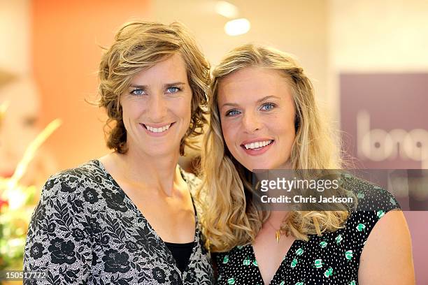 Olympic Gold Medal winning rowers Anna Watkins and Katherine Grainger pose for a photograph as fashion label, Long Tall Sally, hosts event to...