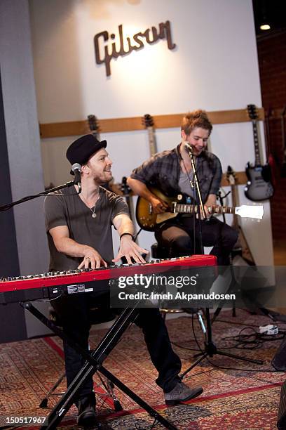 Musicians Gavin DeGraw and Billy Norris perform onstage at Microsoft's Shape The Future Program To Benefit VH1 Save The Music at Gibson Guitar...