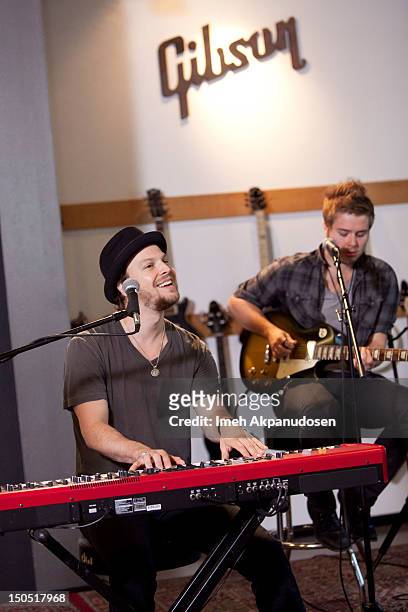 Musicians Gavin DeGraw and Billy Norris perform onstage at Microsoft's Shape The Future Program To Benefit VH1 Save The Music at Gibson Guitar...