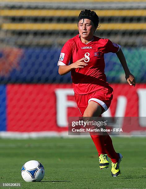Hwa Myong Jon of Korea DPR runs with the ball during the FIFA U-20 Women's World Cup 2012 group C match between Korea DPR and Norway at Kobe...
