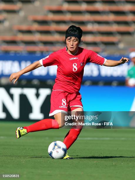 Hwa Myong Jon of Korea DPR runs with the ball during the FIFA U-20 Women's World Cup 2012 group C match between Korea DPR and Norway at Kobe...