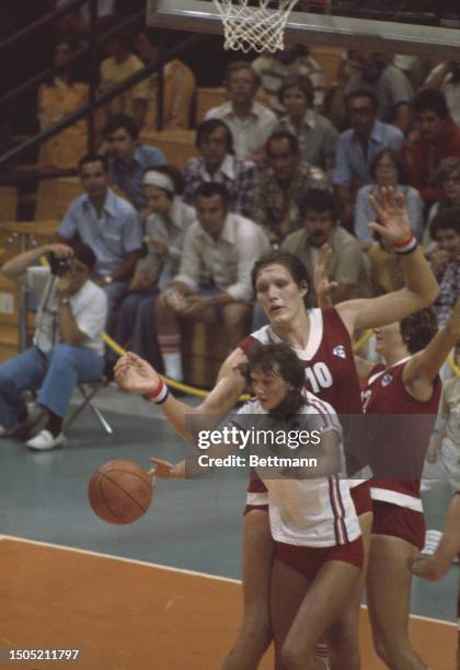 Uljana Semjonova of the USSR towers over Czechoslovakia's Dana Ptackova during a women's basketall game at the Summer Olympics in Montreal, July 20th...