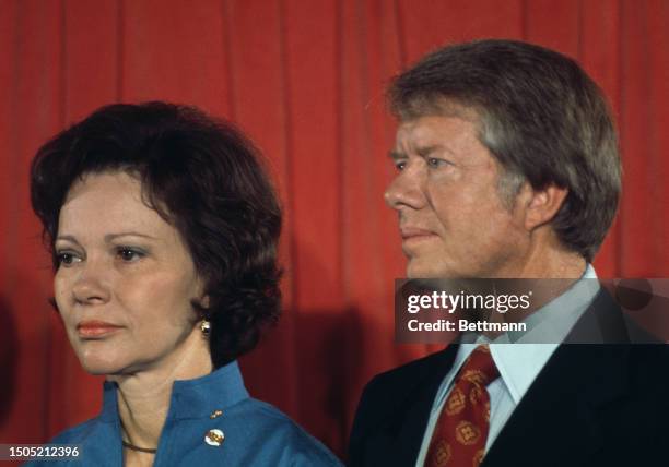 Democratic presidential candidate Jimmy Carter and his wife Rosalynn attend a press conference in New York, July 15th 1976. At the press conference...