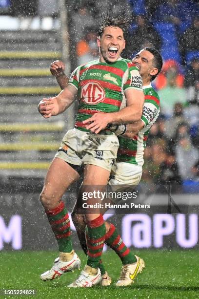 Cameron Murray of the Rabbitohs celebrates with Cody Walker of the Rabbitohs after scoring a try during the round 18 NRL match between New Zealand...