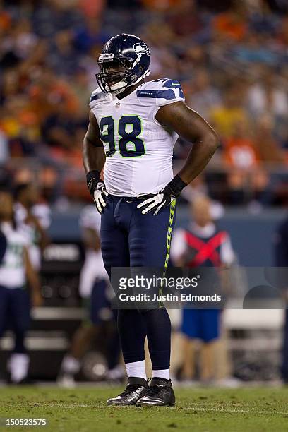 Defensive end Greg Scruggs of the Seattle Seahawks in action against the Denver Broncos at Sports Authority Field Field at Mile High on August 18,...