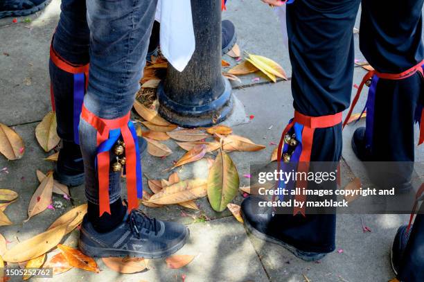 ribbons and bells on morris dancers legs. gloucestershire - traditional ceremony stock pictures, royalty-free photos & images