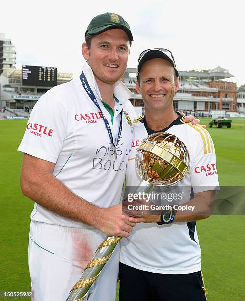 South Africa captain Graeme Smith and coach Gary Kirsten celebrate with the ICC World Test mace after winning the 3rd Investec Test match between...