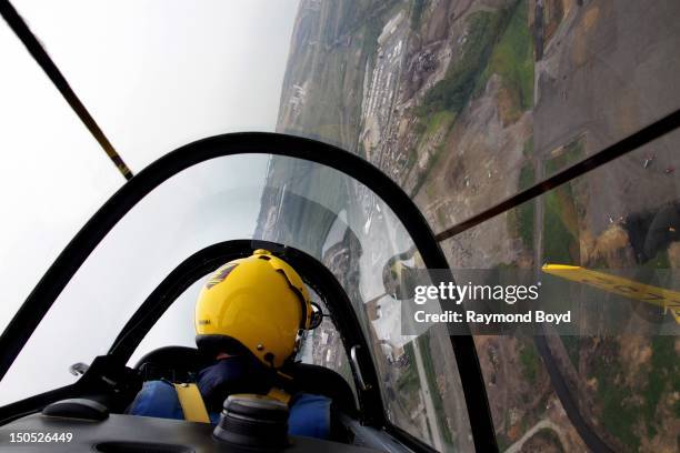 Mark "Enigma" Miller, of The Lima Lima Flight Team, practices stunts over Gary, Indiana in preparation for Chicago's 54th Annual Air & Water Show in...