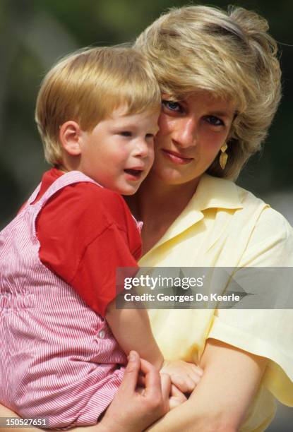 Diana, Princess of Wales with Prince Harry on holiday in Majorca, Spain on August 10, 1987.