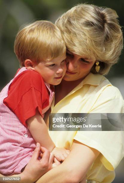 Diana, Princess of Wales with Prince Harry on holiday in Majorca, Spain on August 10, 1987.