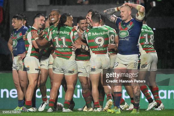 Alex Johnston of the Rabbitohs celebrates with team mates after scoring a try during the round 18 NRL match between New Zealand Warriors and South...