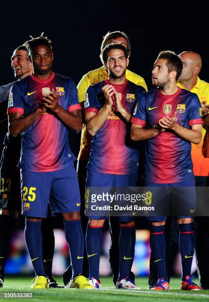 Newly signed FC Barcelona player Alex Song , Cesc Fabregas and Jordi Alba of FC Barcelona look on prior to the Joan Gamper Trophy friendly match...