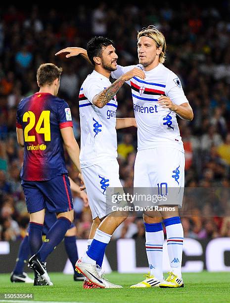 Roberto Soriano of Sampdoria celebrates with his teammate Maxi Lopez after scoring the opening goal during the Joan Gamper Trophy friendly match...