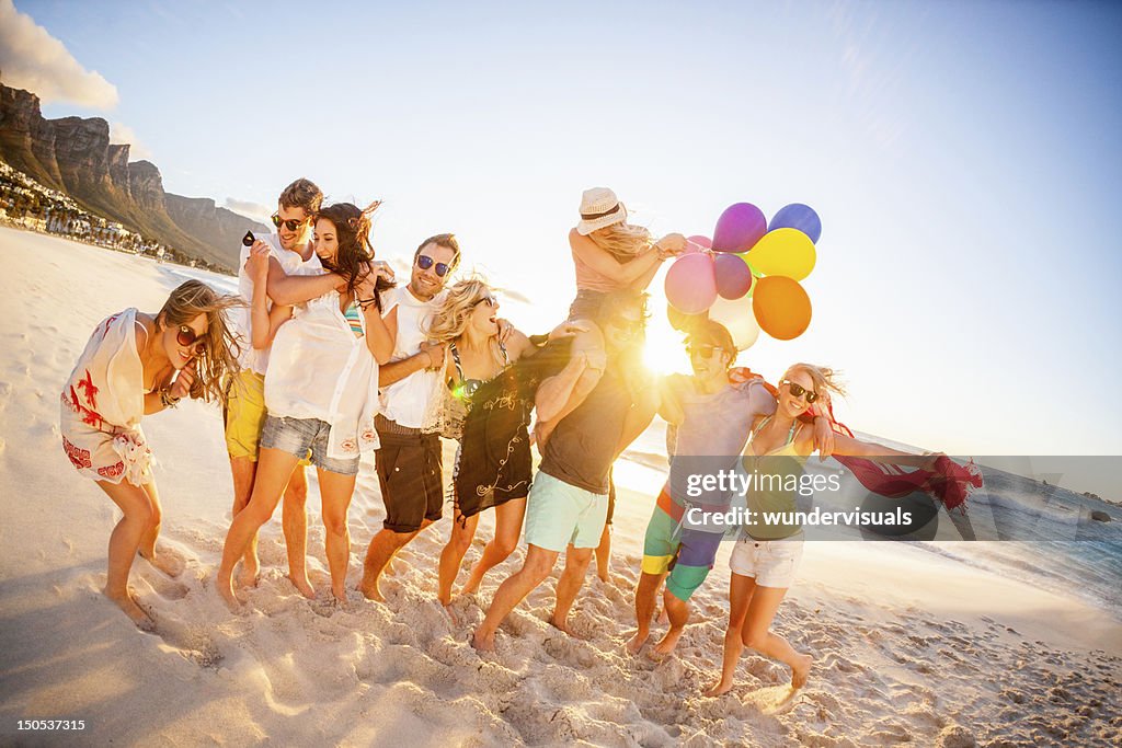 Young Party People having fun at the beach