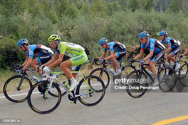 Vincenzo Nibali of Italy riding for Liquigas-Cannondale rides in the breakaway with Garmin-Sharp riders David Zabriskie of the USA, Peter Stetina of...