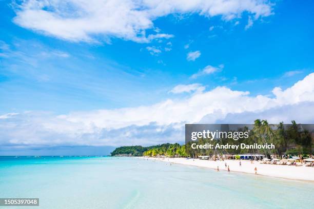 view of white sand beach and blue sea, boracay island, philippines. - boracay beach stock pictures, royalty-free photos & images