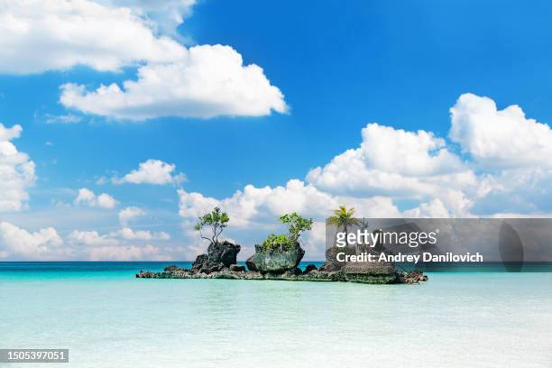 willy's rock at boracay island, philippines - scenic white beach view. - boracay beach stock pictures, royalty-free photos & images