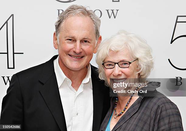 Actress Betty Buckley poses with actor Victor Garber backstage following his performance at 54 Below on August 20, 2012 in New York City.
