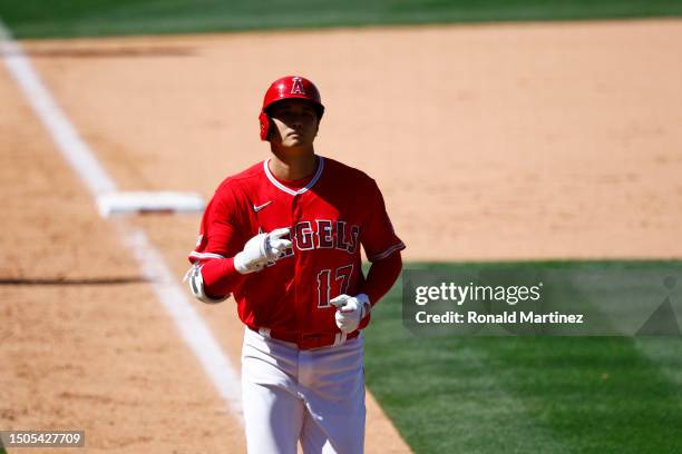 Shohei Ohtani of the Los Angeles Angels celebrates a home run against the Chicago White Sox in the ninth inning at Angel Stadium of Anaheim on June...