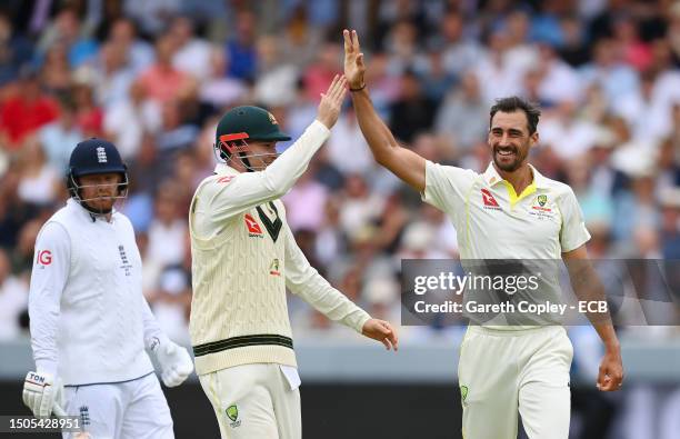 Mitchell Starc of Australia celebrates with teammate Matthew Renshaw after dismissing Harry Brook of England during Day Three of the LV= Insurance...