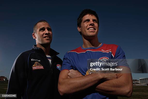 Lindsay Gilbee and Ryan Hargrave of the Bulldogs pose after announcing they are both retiring during a Western Bulldogs AFL Media Session at Whitten...