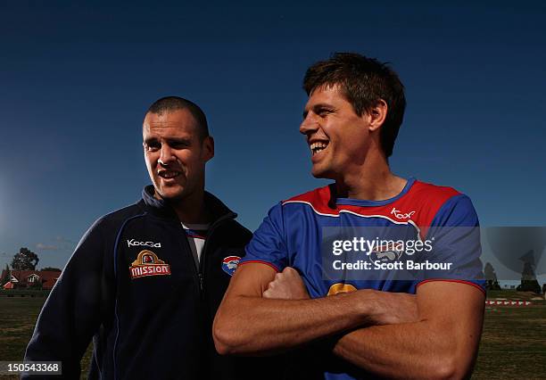 Lindsay Gilbee and Ryan Hargrave of the Bulldogs pose after announcing they are both retiring during a Western Bulldogs AFL Media Session at Whitten...