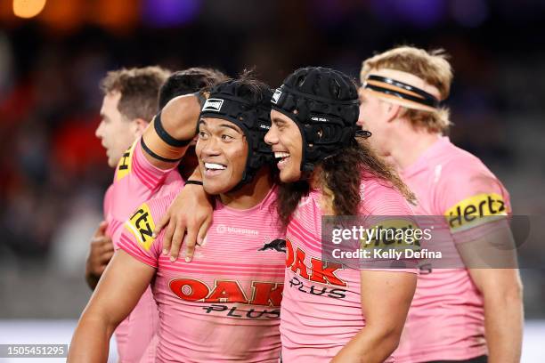 Brian To'o of the Panthers celebrates scoroing a try with Jarome Luai of the Panthers during the round 18 NRL match between Melbourne Storm and...