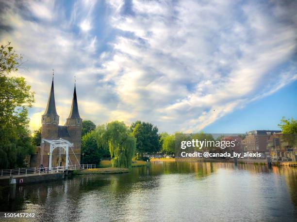 gorgeous cloudscape over delft - nieuwe kerk delft stock pictures, royalty-free photos & images