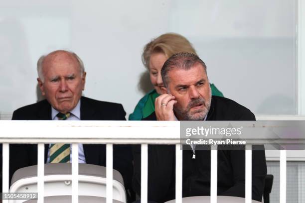 Former Prime Minister of Australia, John Howard and Manager of Tottenham Hotspur FC, Ange Postecoglou, look on from the Cricket Australia Suite...
