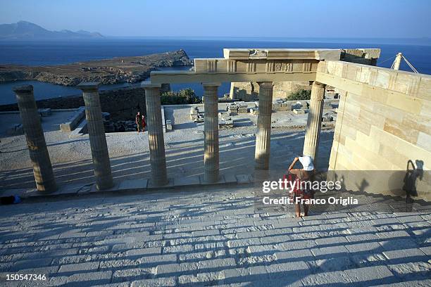 View of the Lindos Acropolis on June 25, 2012 in Lindos - Rhodes, Greece. Rhodes is an island located in the eastern Aegean Sea. Historically, Rhodes...