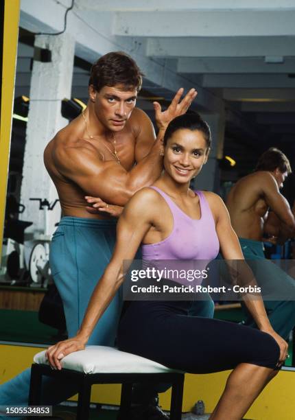 Martial arts actor Jean-Claude Van Damme and wife Gladys Portugues at the Weider Gym in Paris.