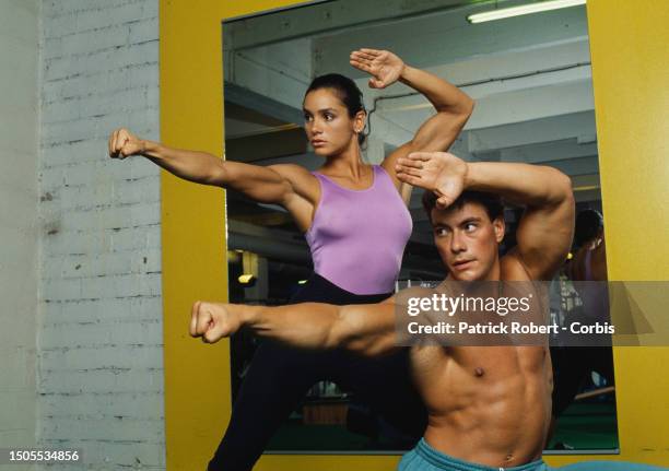 Martial arts actor Jean-Claude Van Damme and wife Gladys Portugues at the Weider Gym in Paris.