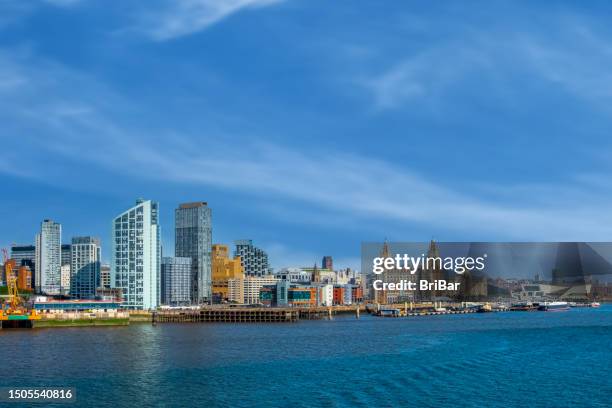 liverpool city skyline, waterfront and the three graces - river mersey liverpool stock pictures, royalty-free photos & images