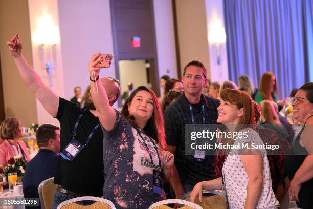 People attend the Moms for Liberty Joyful Warriors national summit at the Philadelphia Marriott Downtown on June 30, 2023 in Philadelphia,...