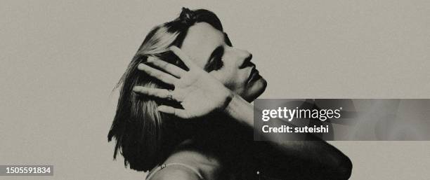 completely in itself. not now. - femininity stock pictures, royalty-free photos & images