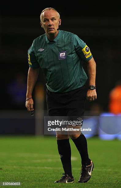 Referee P Gibbs in action during the npower Championship match between Wolverhampton Wanderers and Barnsley at Molineux on August 21, 2012 in...