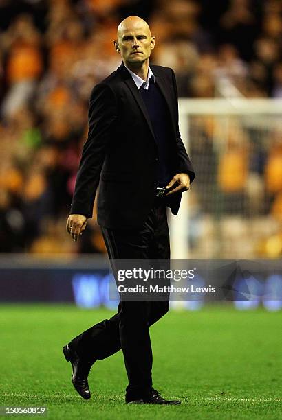 Stale Solbakken, manager of Wolverhampton Wanderers walks off the pitch after the npower Championship match between Wolverhampton Wanderers and...