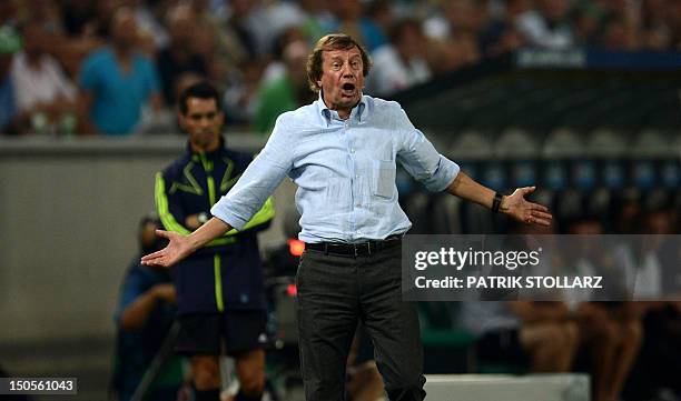 Kyiv´s headcoach Yuri Semin reacts during the Champions League Play-off round 1 st leg football match Borussia Moenchengladbach vs FC Dynamo Kyiv on...